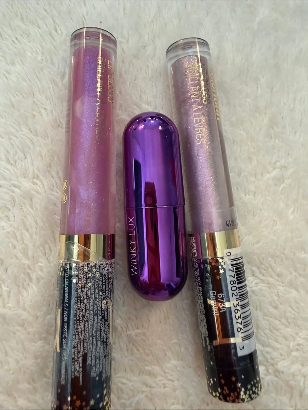 Winky Lux and Wet n wild lilac and purple lipstick and lip gloss tb